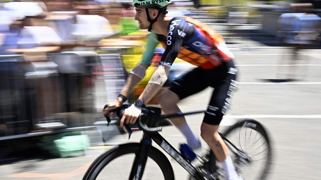 Paul Seixas climbing during a grueling mountain stage of the Tour de France.