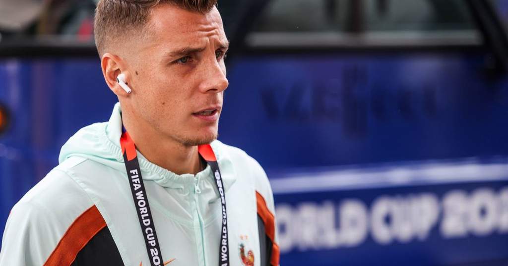 Lucas Digne smiling during a training session with France.