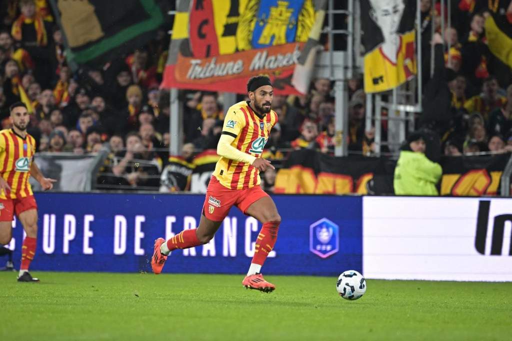 Angelo Fulgini playing in a football match for RC Lens.