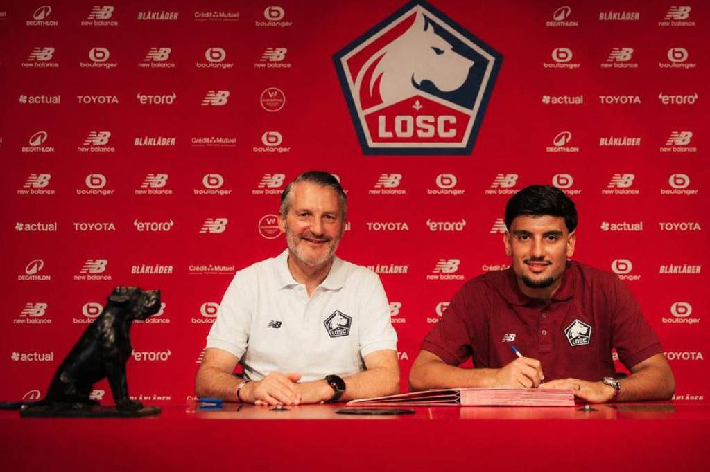 New Lille OSC signing Basar Onal posing in club colors