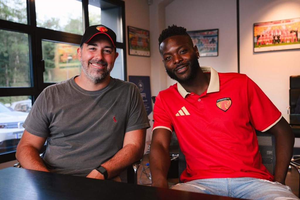 Striker Louis Mafouta posing with the Le Mans FC jersey.