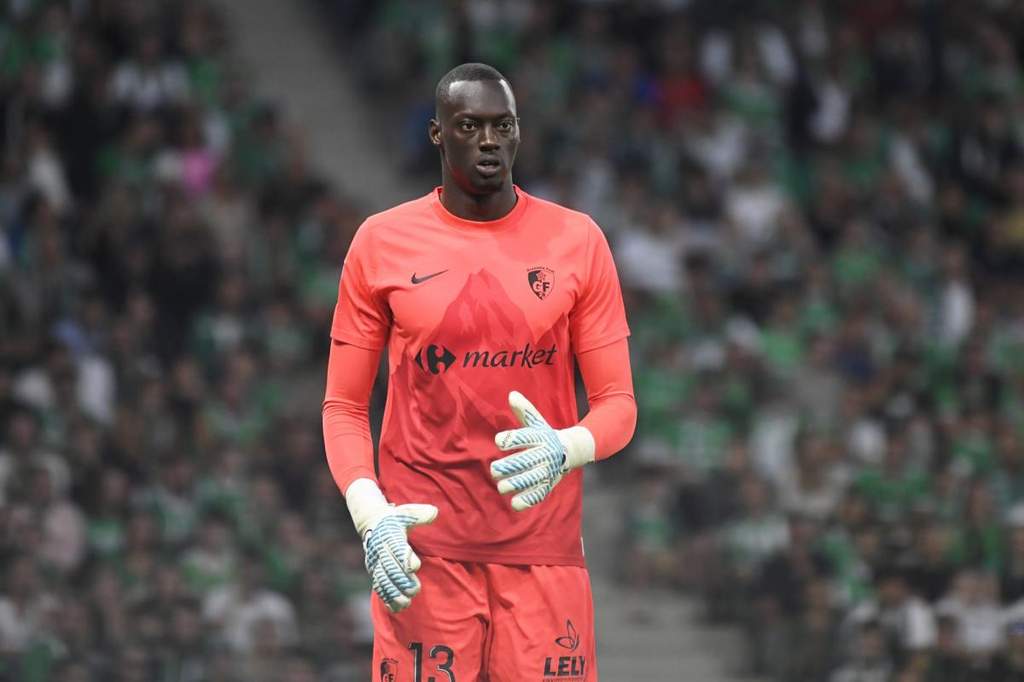 Goalkeeper Mamadou Diop smiling during his official AJ Auxerre presentation