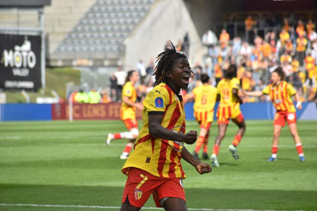 Striker Aude Gbedjissi celebrating a goal for RC Lens