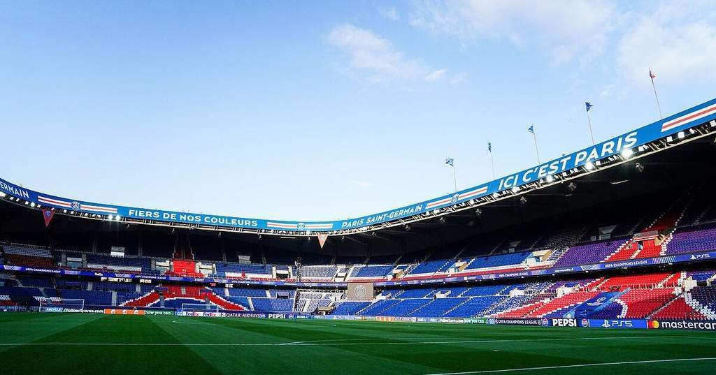 The iconic exterior of the Parc des Princes stadium in Paris.