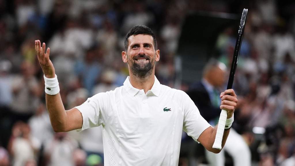 Novak Djokovic hitting a forehand at Wimbledon